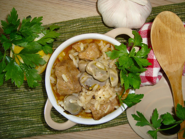 Arroz de favas com carne em vinha d’alhos